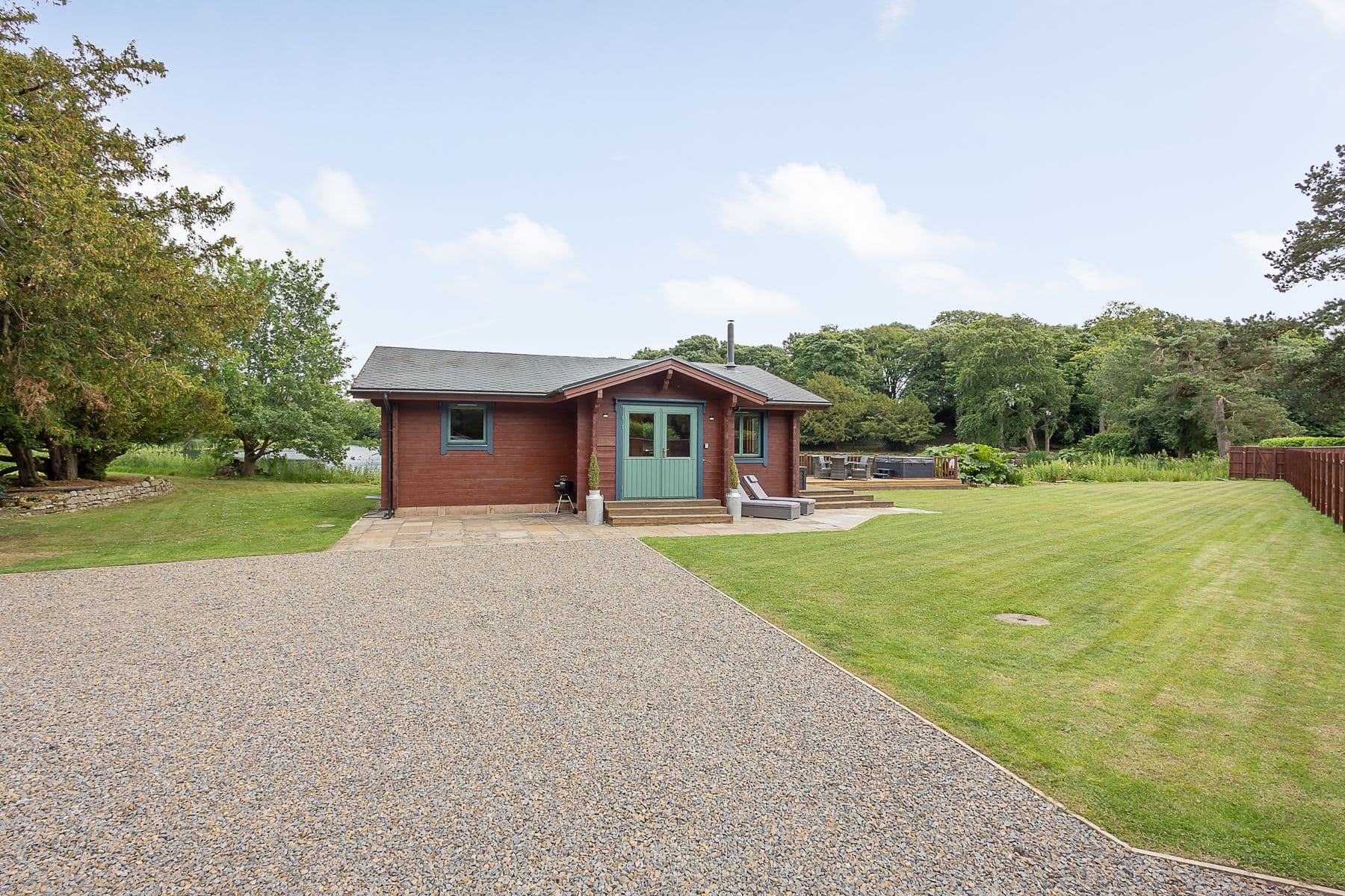 The lodge from the gravel drive